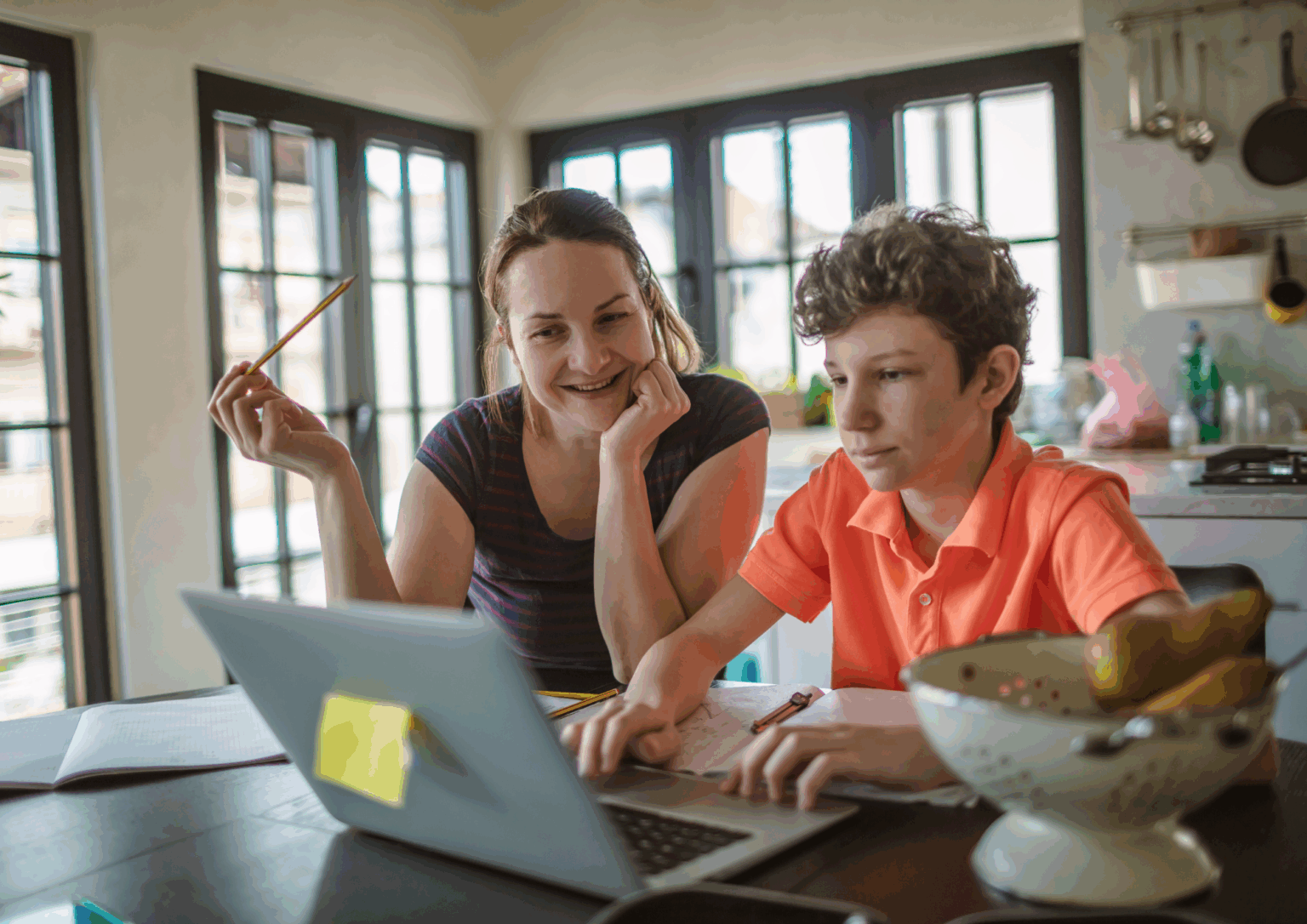 mother and son showing a structured learning environment at home